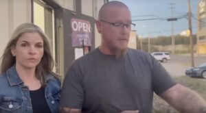Photo of Mindy and Steve outside of boxing gym